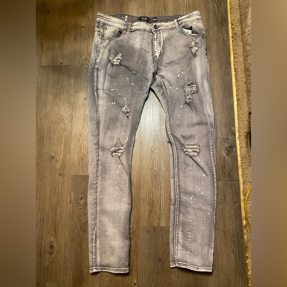 Grey ripped jeans